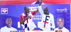 Mattew Opoku Prempeh Holding Robbert's Hands .png