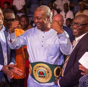 President John Dramani Mahama in a championship belt