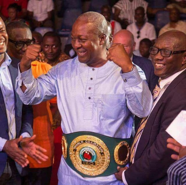 President John Dramani Mahama in a championship belt