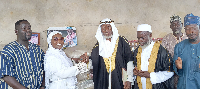 Dorcas  Affo-Toffey (in white)shaking hands with the Jomoro Municipal Chief Imam, Alhaji Siedu Jallo
