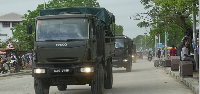 Tanzania Army patrol the street during vote counting in Zanzibar, Tanzania, Friday, Oct. 31, 2025