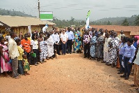 A group pic of some dignitaries and community members at the commissioning of the borehole