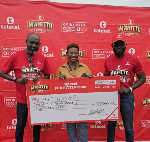 Telecel Ghana officials presented cash rpize to M’ahitti Promo winner