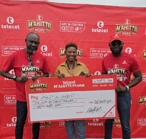Telecel Ghana officials presented cash rpize to M’ahitti Promo winner
