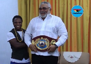 Isaac Dogboe strapped the belt on JJ Rawlings