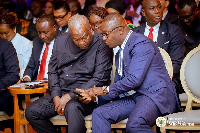Minister of Energy and Green Transition, Dr John Abdulai Jinapor and President Mahama at the summit