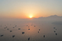 A drone view shows vessels in the Strait of Hormuz, as seen from Musandam, Oman