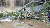 Fire personnel on salvage operations after the Kintampo Waterfalls accident