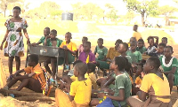 Some students of Amenga-Etego Primary School in their 'classroom'