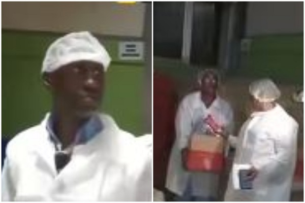 Richard Jakpa (L) and other officials at Nutrifoods Ghana Limited, the manufacturer of Tasty Tom