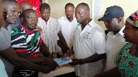 Emmanuel Armah-Kofi Buah submitting his nomination forms