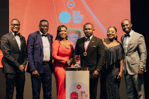 Dr Elton Fredrick Afari and his team with the award