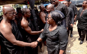 Vice President Dr. Bawumia and other party members shaking hands with family members