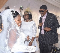 Hanks Anuku,Others on the dance floor with bride and groom