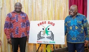 A photo of the President and Vice President with the free SHS logo