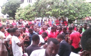 Scores of workers clad in red armband and red headgear were at the entrance of the hotel.