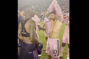 Afful with Messi after the game
