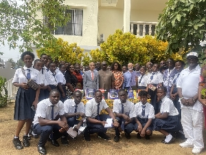 A group picture of the speakers and some students who attended the programme