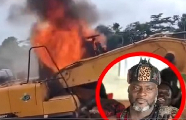 Osaberima Atta Appeakrong Agyei II, circled in red and one of the burning excavators