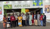Participants of the  26th International AIDS Conference 2026 pose for a photo