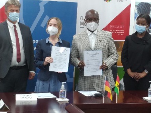 Dorothee Dinkelaker with Yofi Grant after the signing of the MoU