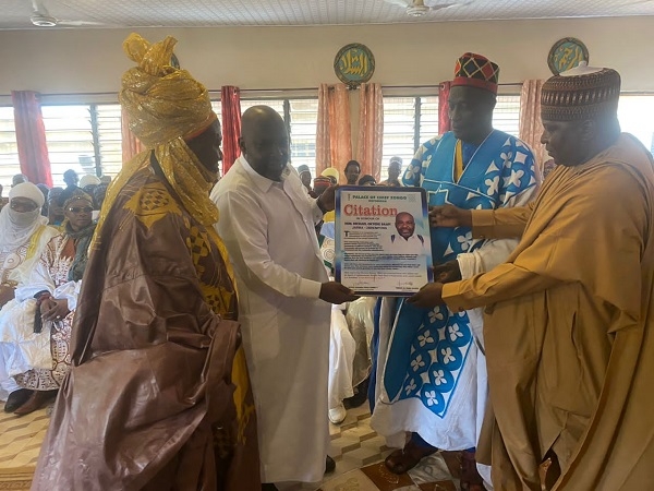 Michael Okyere Baafi receiving the citation