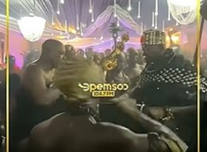 Otumfuo Osei Tutu II, wearing his 'nsebe kye' (hat), dancing to the rhythms from the ‘aprede’ drums