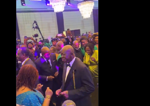 Asanetehene Otumfuo Osei Tutu II [R] on the dance floor