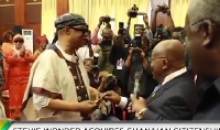President Akufo-Addo presenting Stevie Wonder with his Ghanaian passport