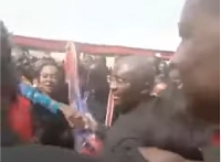 Dr. Bawumia in the midst of a crowd at a funeral at Ajumako