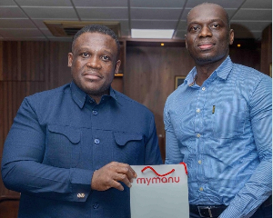 Minister of Communication Sam George with Danny Manu during their meeting