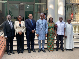 Members of the committee in a group photo with the Minister for Interior