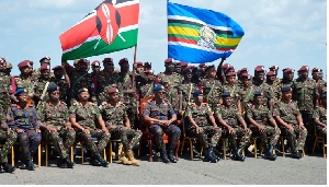 Chief of Defence Forces General Francis Ogolla (C) poses for a picture with Kenya Defence Forces