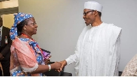 A former senior goment official Lauretta Onochie with former presido Buhari