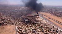Aerial view of black smoke rising above the Khartoum International Airport in Sudan