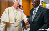 The late Pope Francis (L) with Dr Mahamudu Bawumia (R)