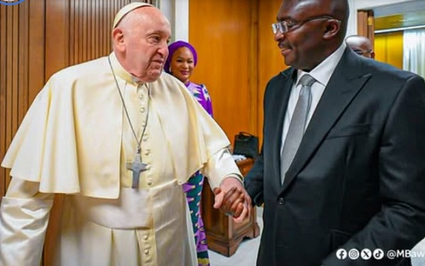 The late Pope Francis (L) with Dr Mahamudu Bawumia (R)