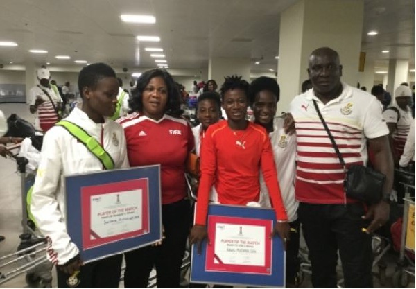 Black maidens arrive at airport