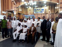 Executive of the GJA in a group photograph with Pastor Mensah Yanney and others