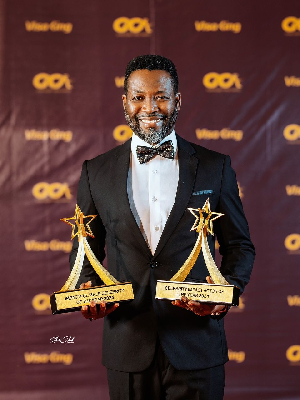 Actor Adjetey Anang receives awards at the Ghana Celebrity Impact Awards
