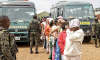 The victims with GIS officers after the rescue