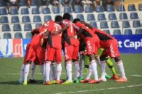 players of WAFA praying before the game