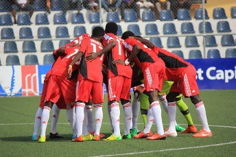 players of WAFA praying before the game