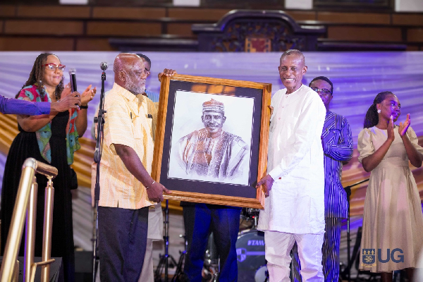 Dr Alhaji Abubakari Sidick Ahmed (in white) being honoured