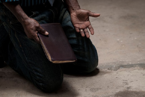 File photo of a Christian man praying