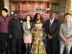 Catherine Afeku, Minister of Tourism, Arts and Culture (in Afrincan print slit and kaba)