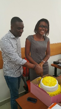 Joe Mettle presented a birthday cake to Abena Agyiewaa Acquah.