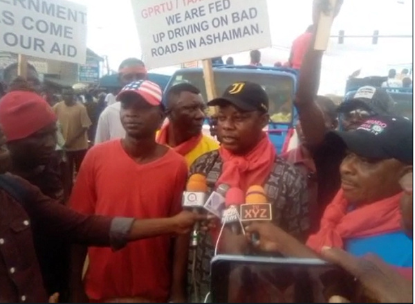 The demonstrators speaking to the media