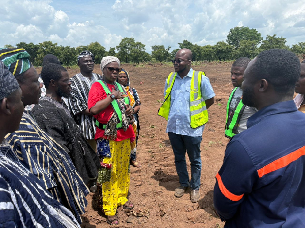 MP (M) observing work on site led by the project engineer, Ransford Obeng and his team of surveyors