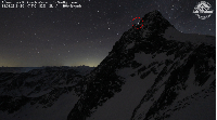 Webcam footage of Grossglockner Mountain, Austria, shows the light from the couple's torches
